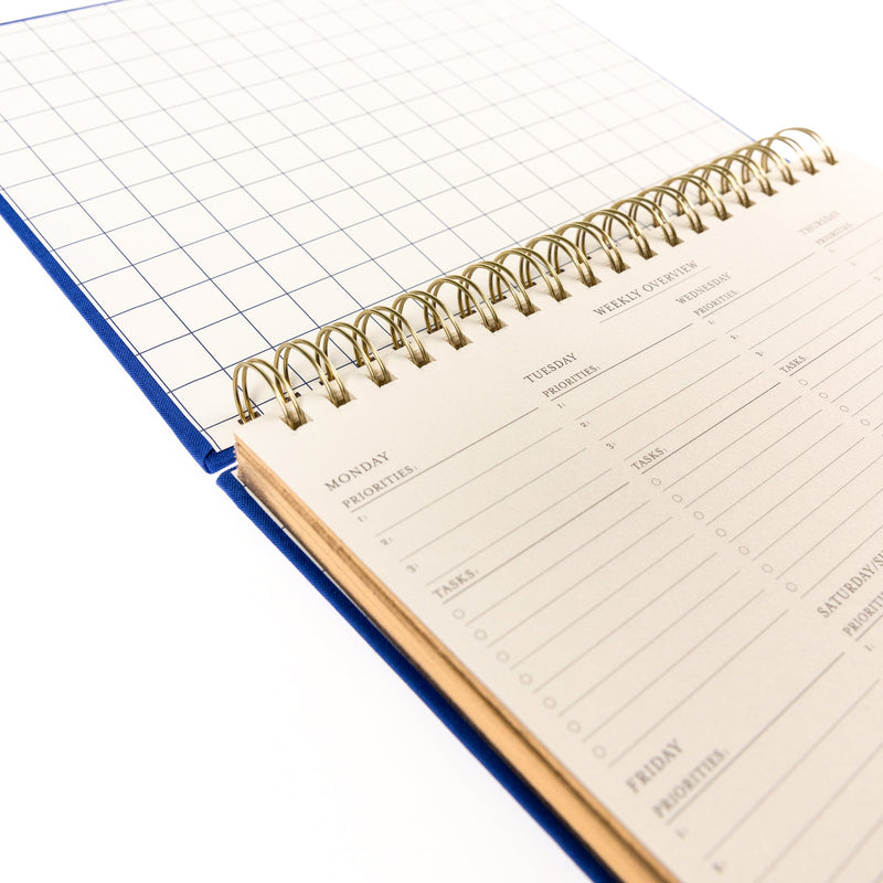 Cobalt Blue Fabric-Bound Weekly Desk Pad weekly layout