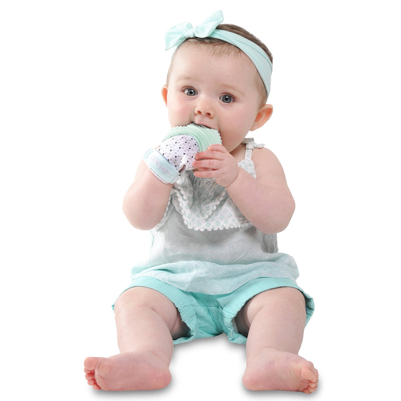 Baby wearing Munch Mitt