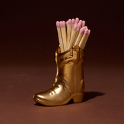 Cowboy boot match holder styled