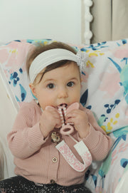 Baby using Butterfly Brush teether