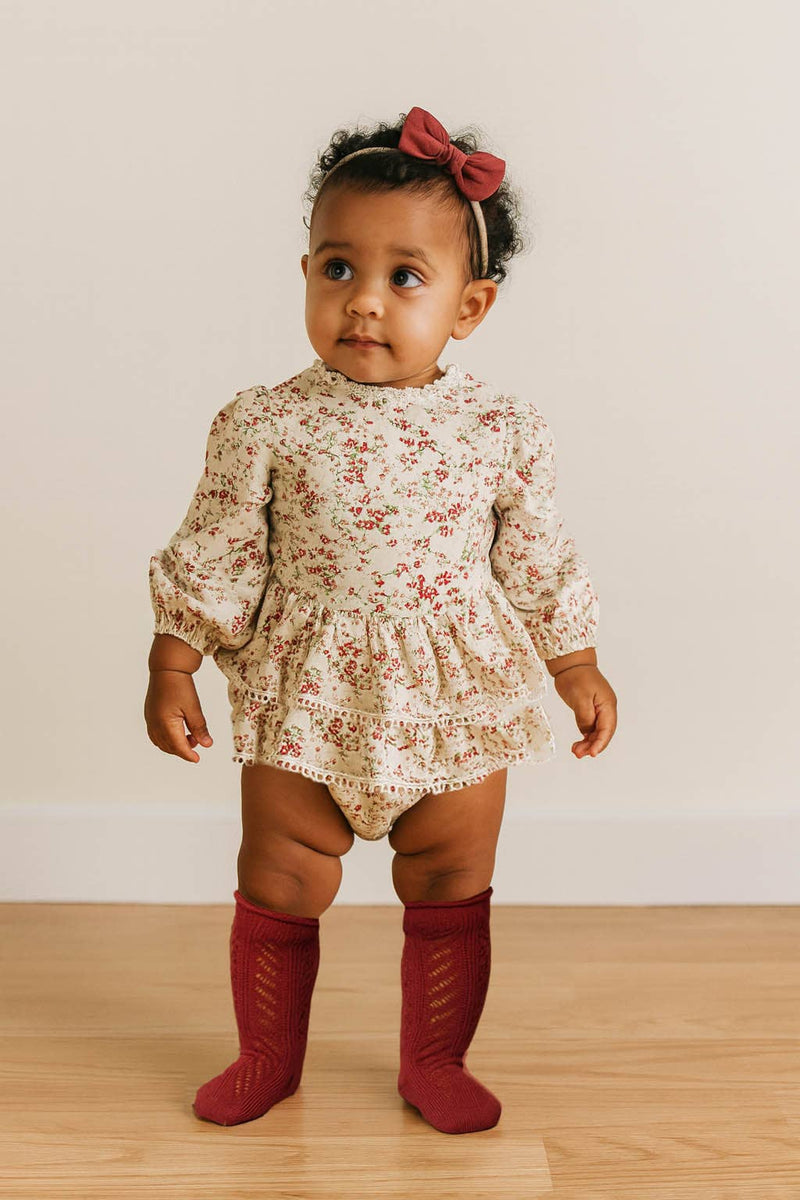 Bella Floral Romper: 2pc set (romper+bow) / 6-9 months