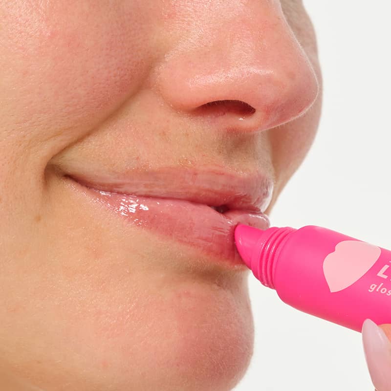 Lip Service gloss-to-balm applied, close-up of lips